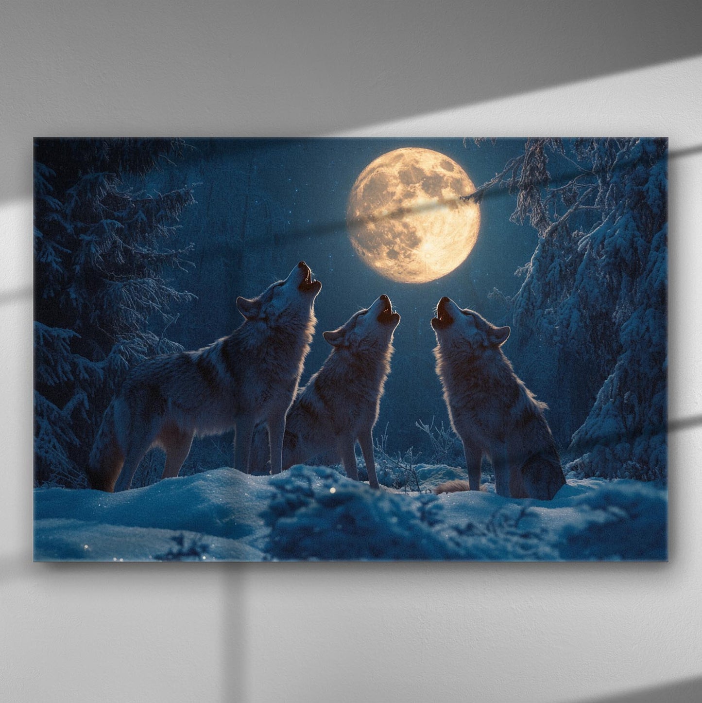 Three wolves howling at the full moon in a snowy forest canvas print.