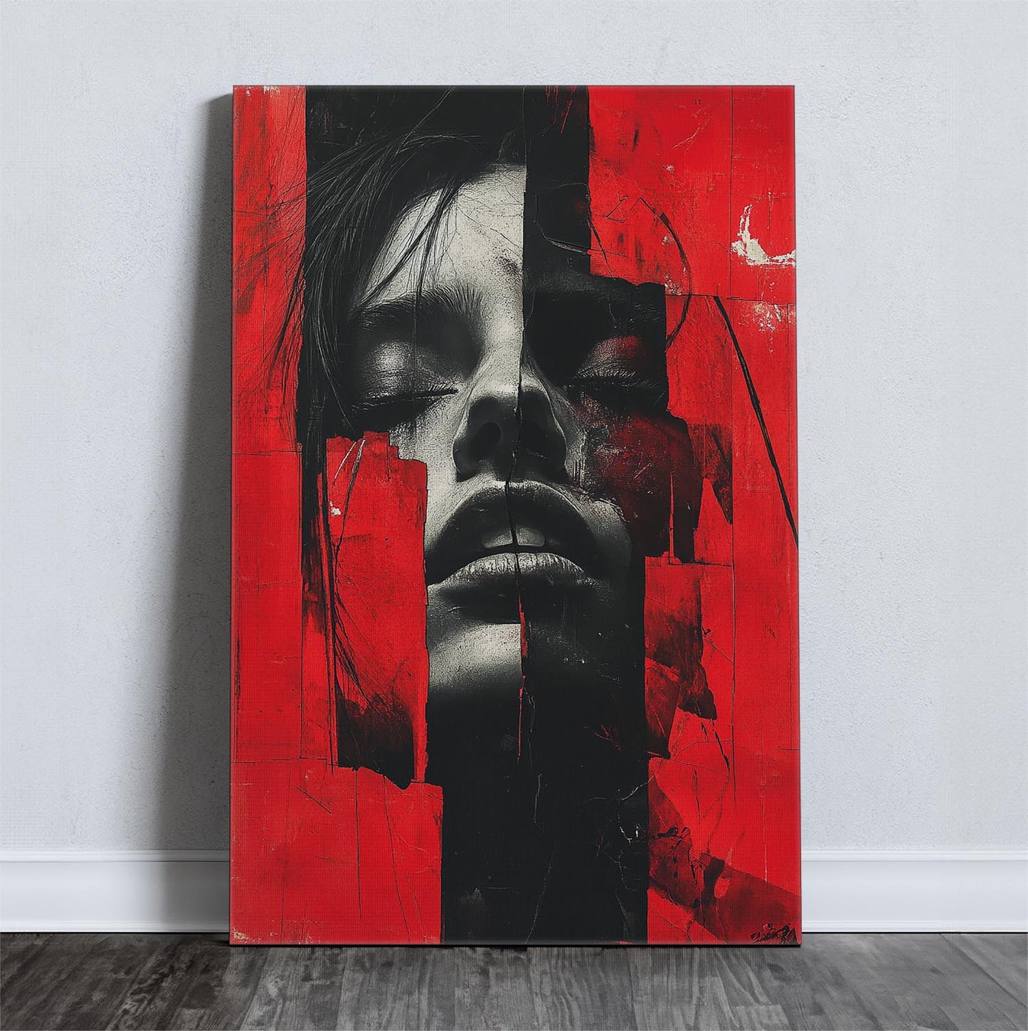 Abstract art with a fragmented human face in red and black on a canvas.
