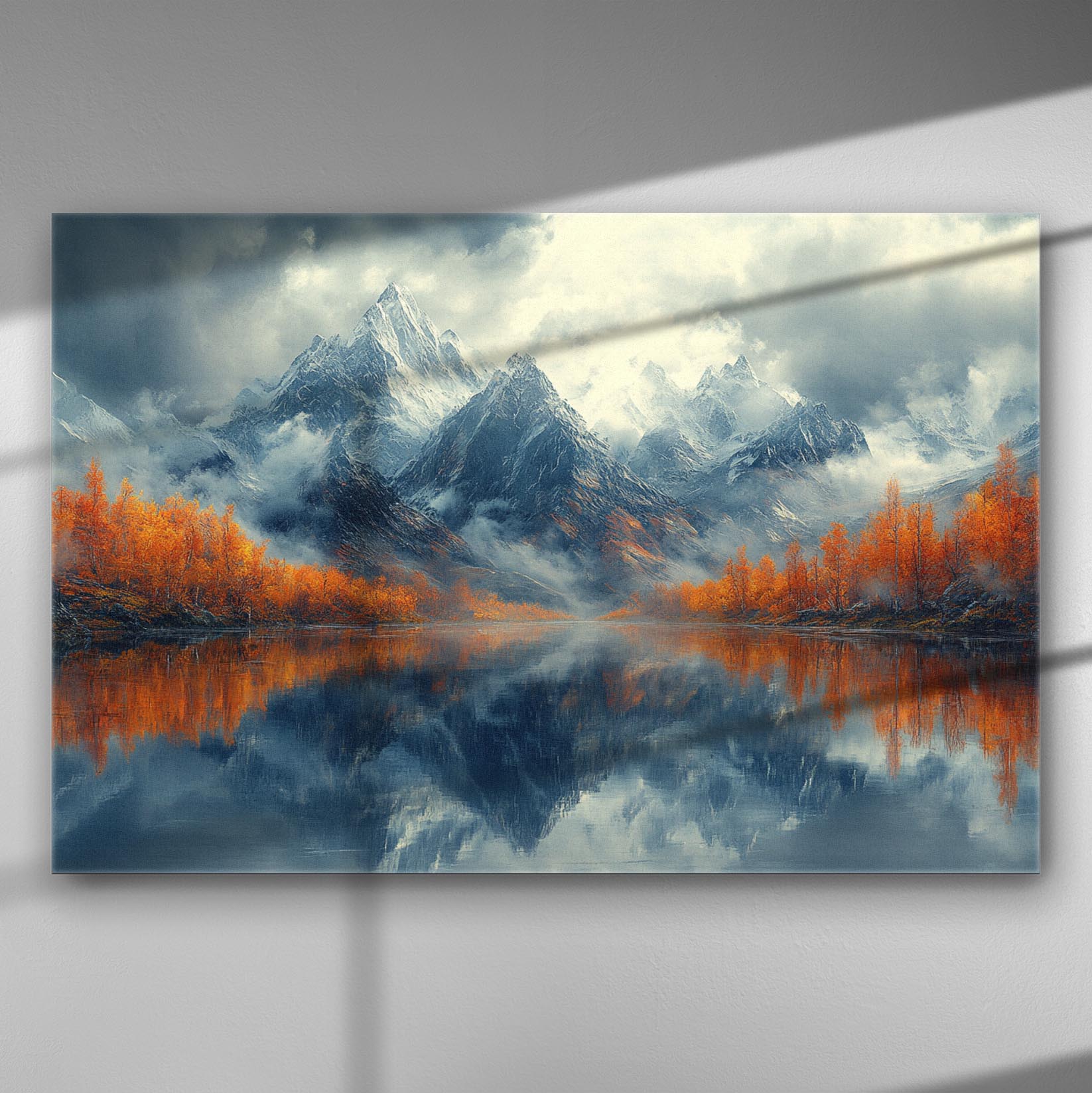 A serene mountain landscape with autumn colors, featuring snow-capped peaks and reflective lake.