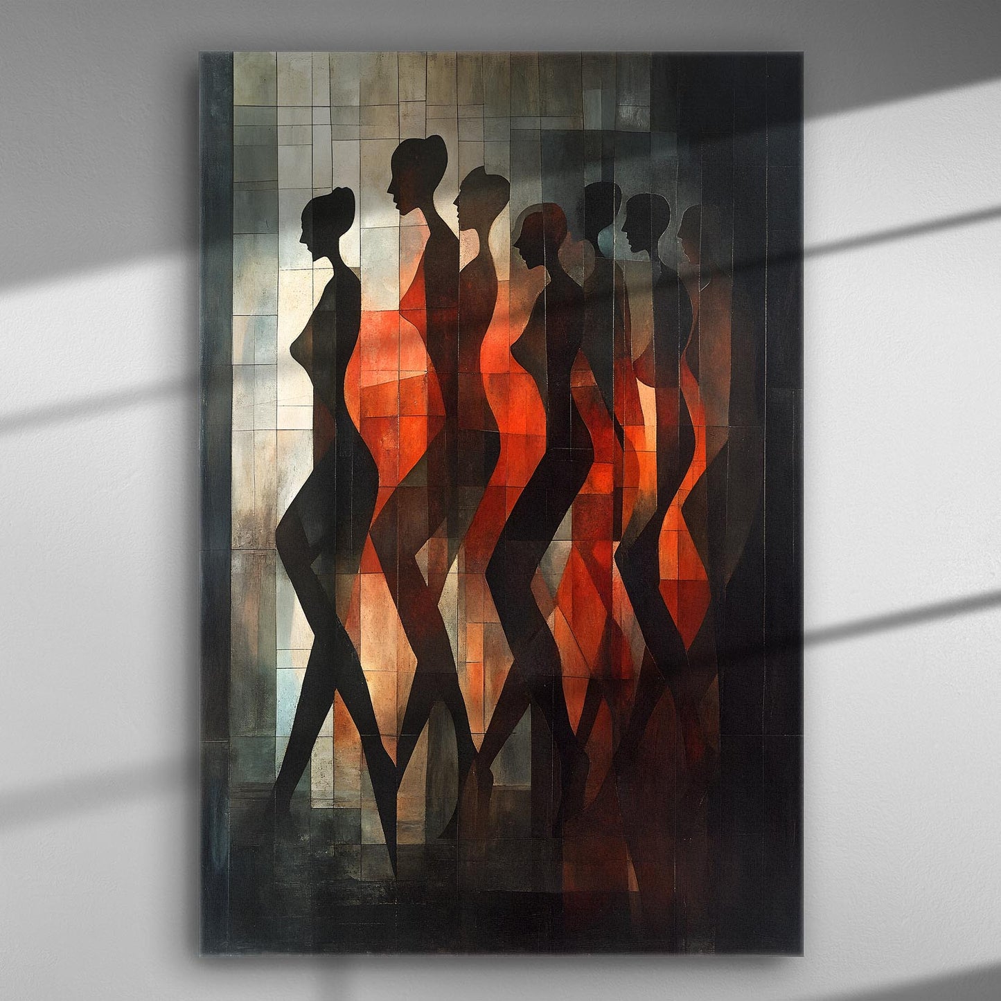 Modern silhouettes with vibrant orange and deep red hues on a canvas print.