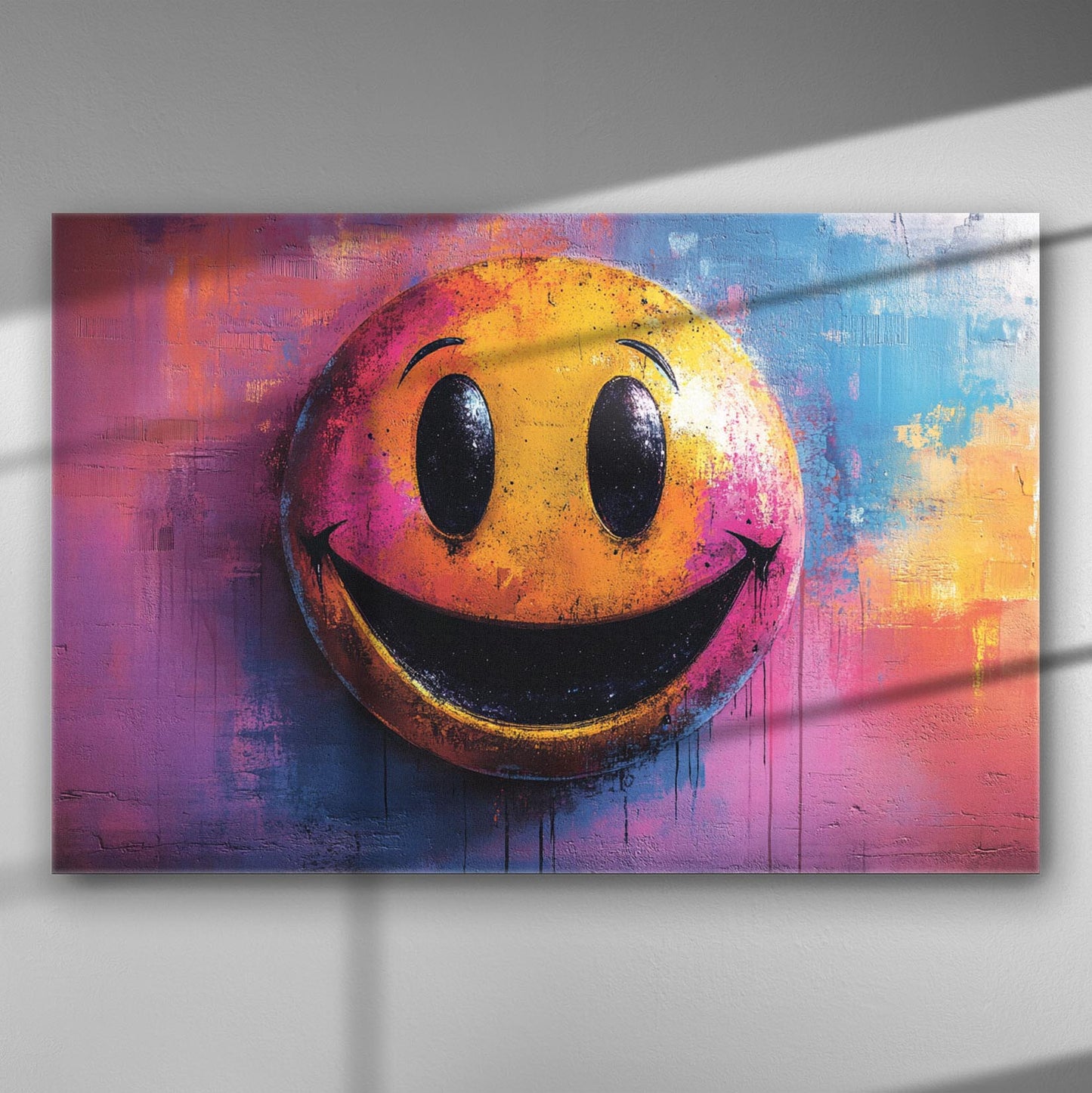 Canvas print of a smiley face with vibrant orange, pink, and blue background.