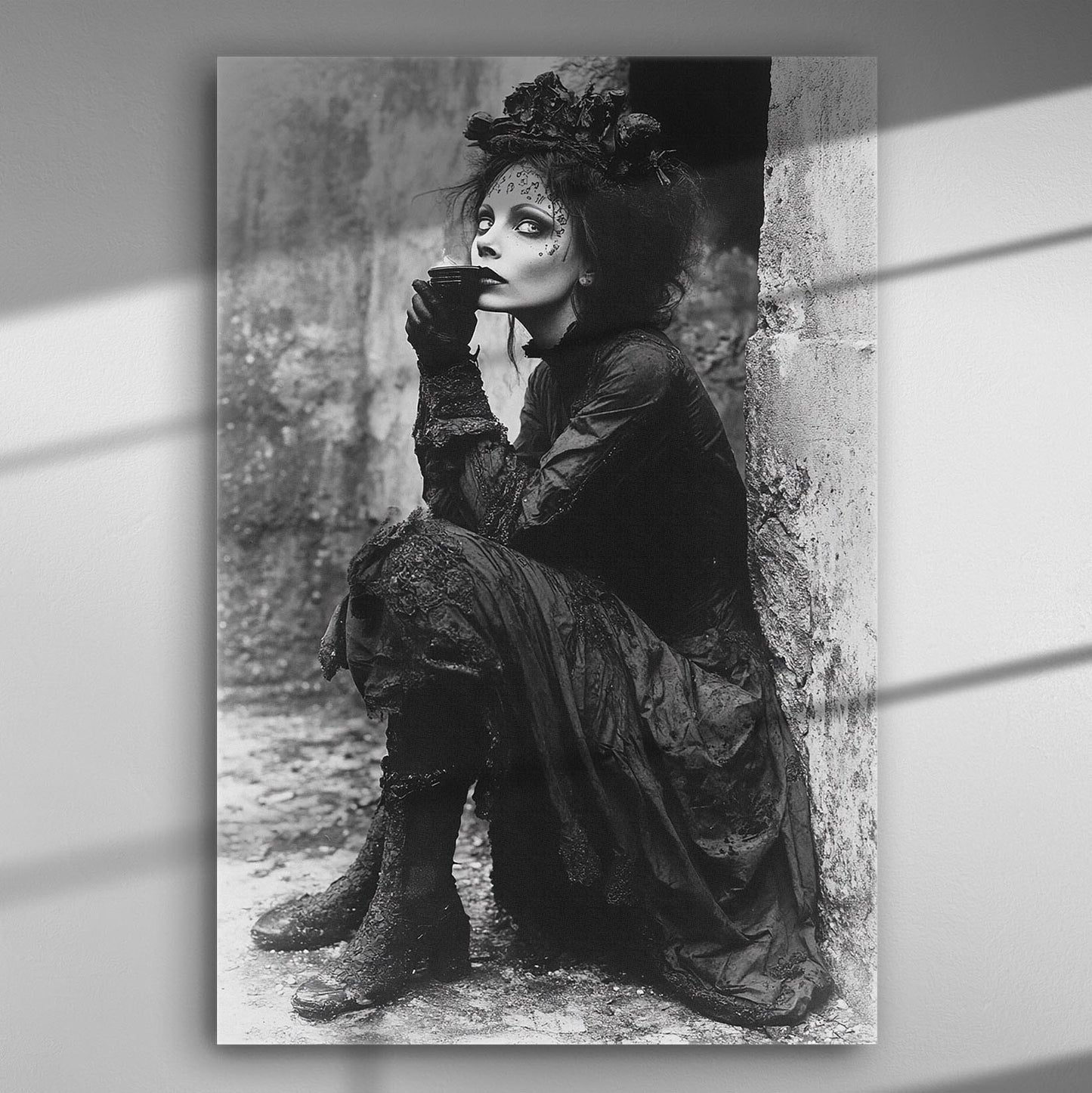 A Victorian-style figure dressed in black, sitting thoughtfully with a dramatic expression on a black and white canvas.