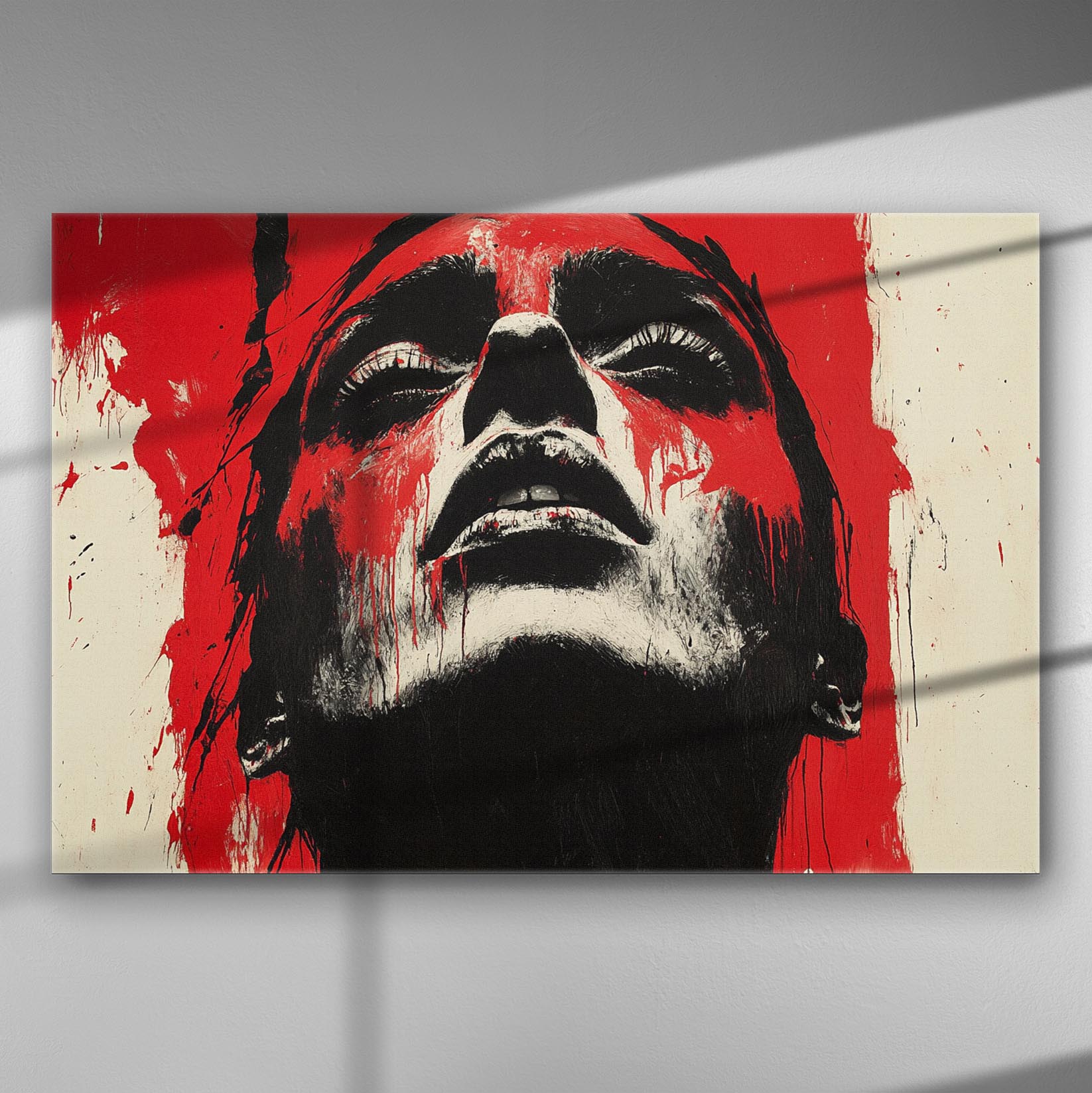 Canvas painting depicting a dramatic expression with red and black colors.