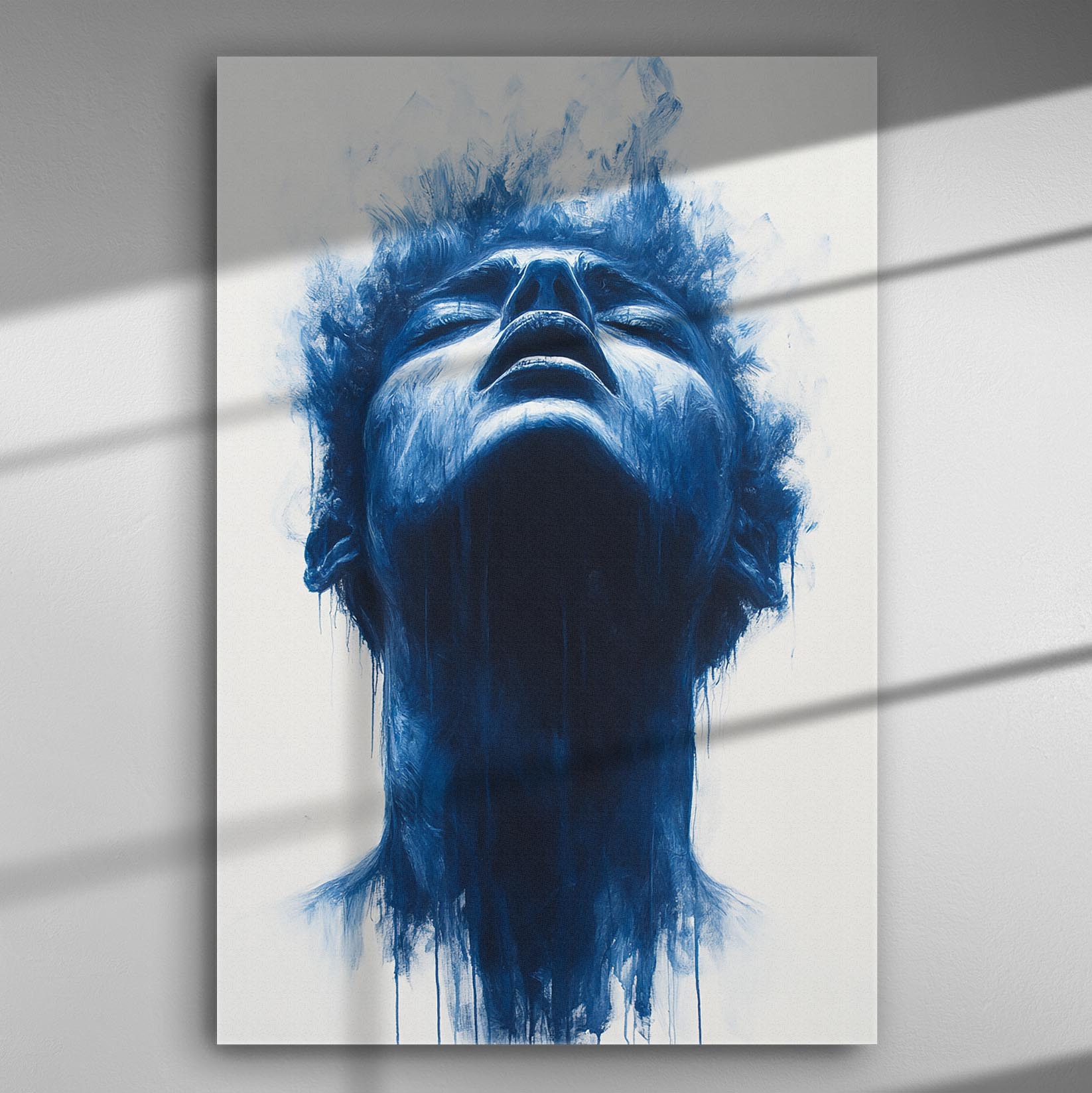 Artistic canvas showing an expressive blue-painted face looking upwards with a misty effect.
