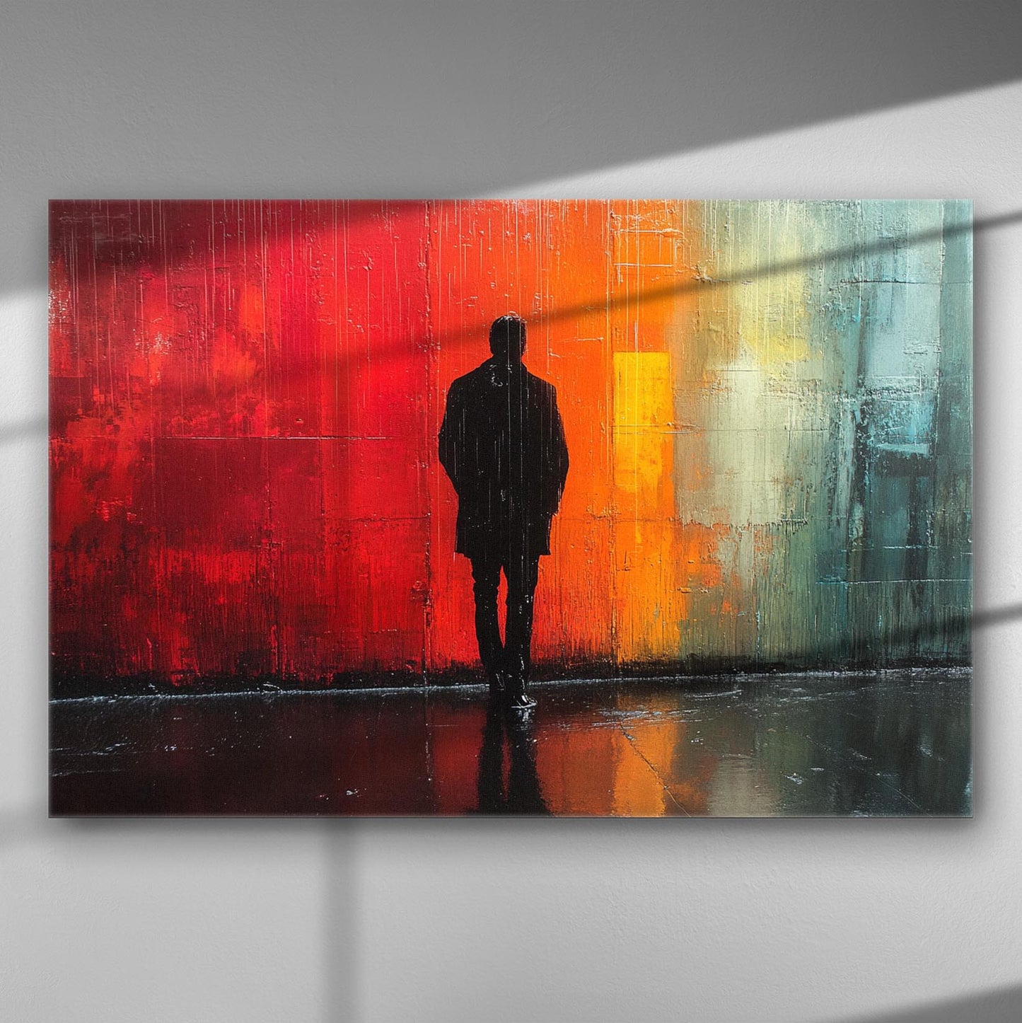 Canvas print of a silhouette of a person walking against a colorful background with red, orange, and blue hues.