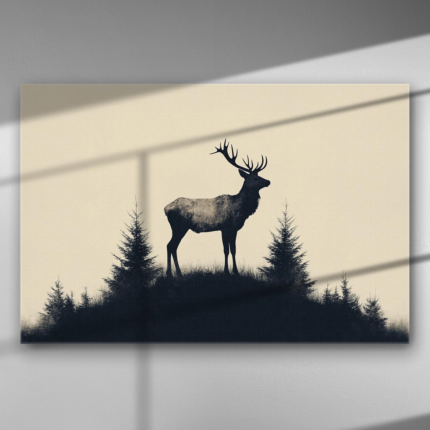 Silhouette of a deer on a hill with trees in the background, minimalist design.