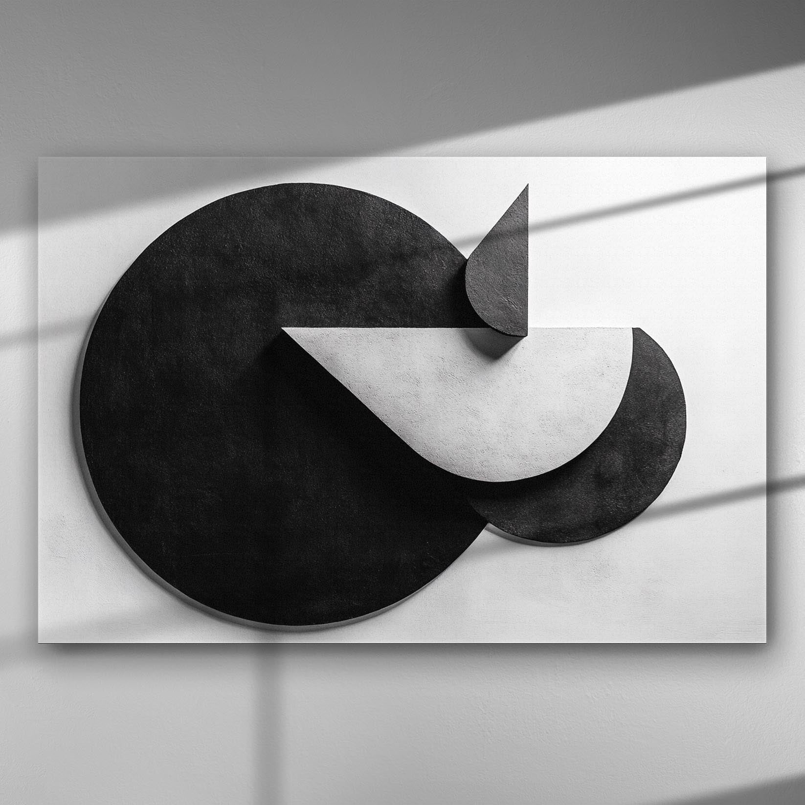 Black and white geometric abstract canvas print with shadows.