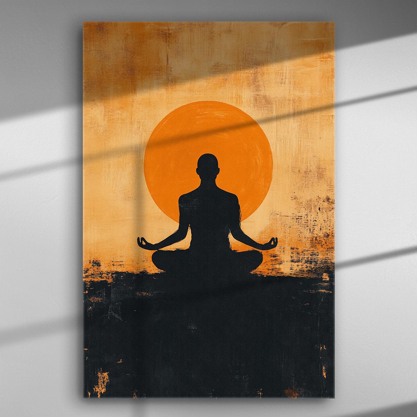 Canvas print of a meditating silhouette against an orange circle backdrop.