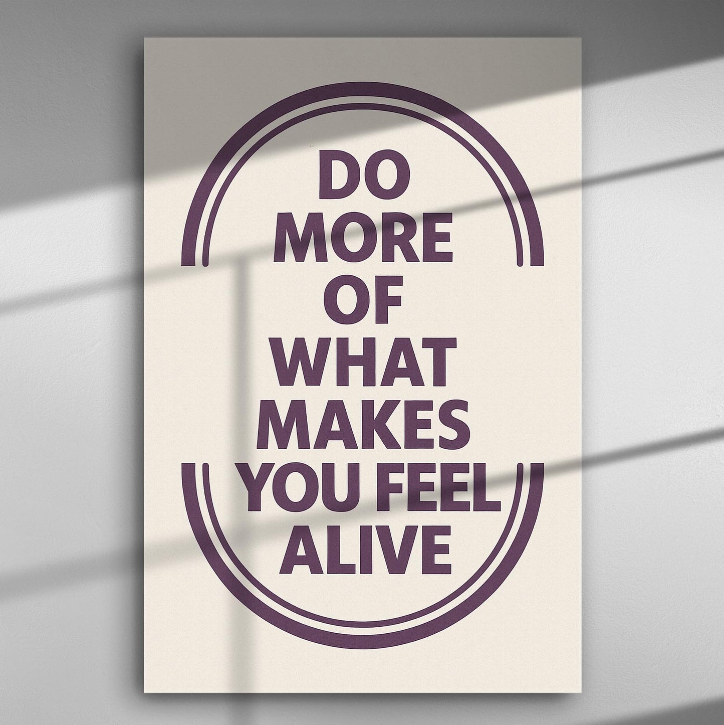 Inspirational quote canvas print reading 'Do more of what makes you feel alive' with bold typography on a light background.