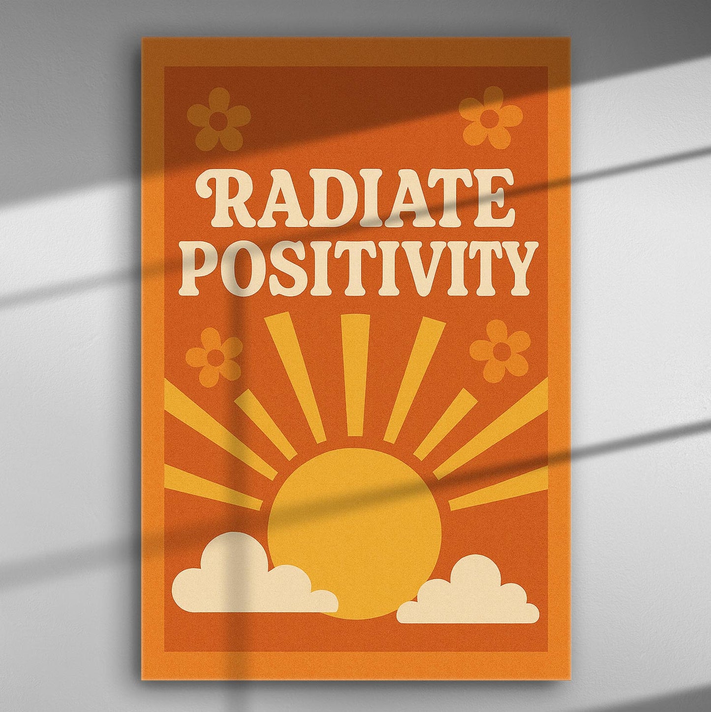 Radiate Positivity orange canvas print with sun and clouds design