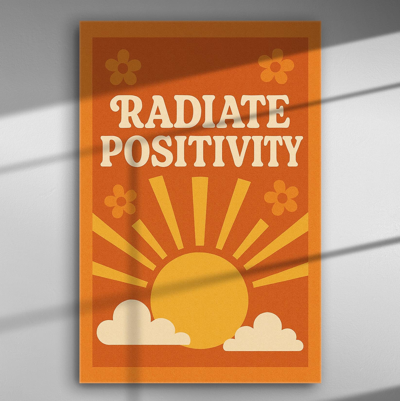 Radiate Positivity orange canvas print with sun and clouds design