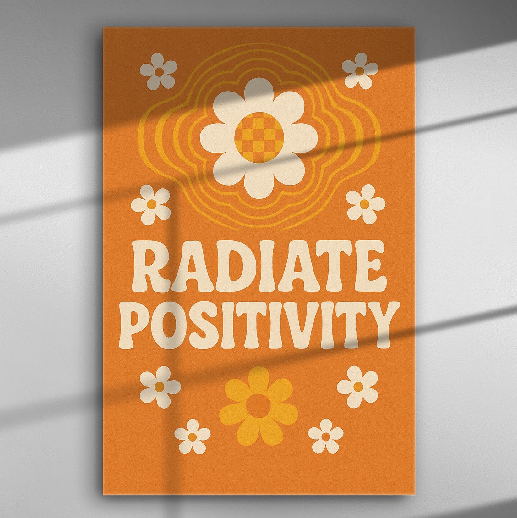 Canvas with text 'Radiate Positivity', orange background, white and orange flowers.