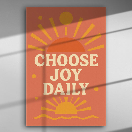 Canvas print with the text 'Choose Joy Daily' in orange and yellow, featuring sunburst graphics.
