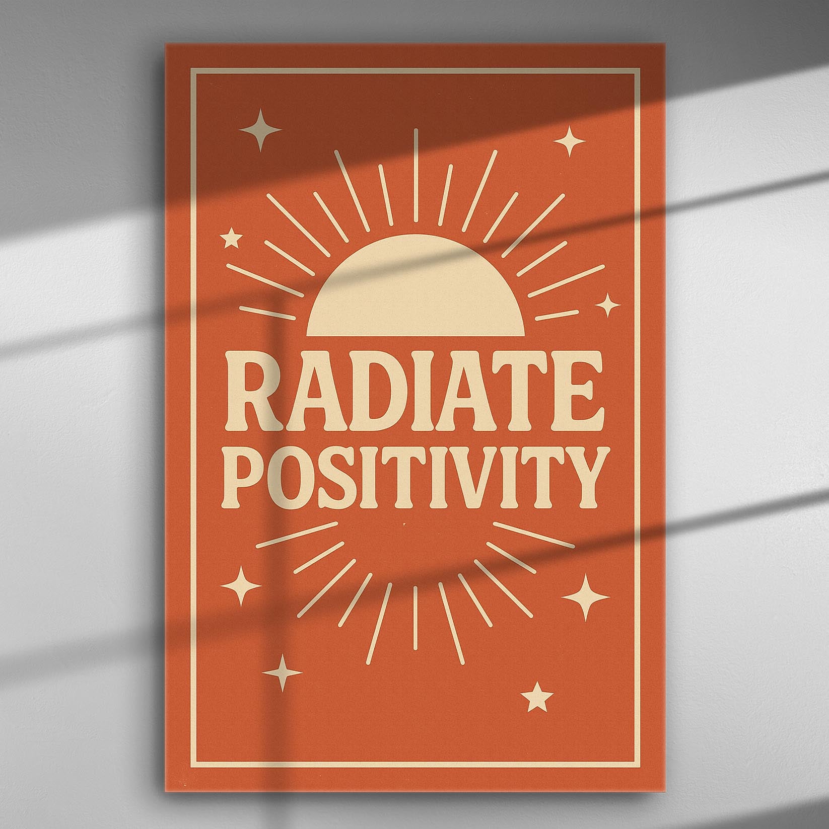 Motivational canvas with 'Radiate Positivity' text in bold, surrounded by stars and sunburst on an orange background.