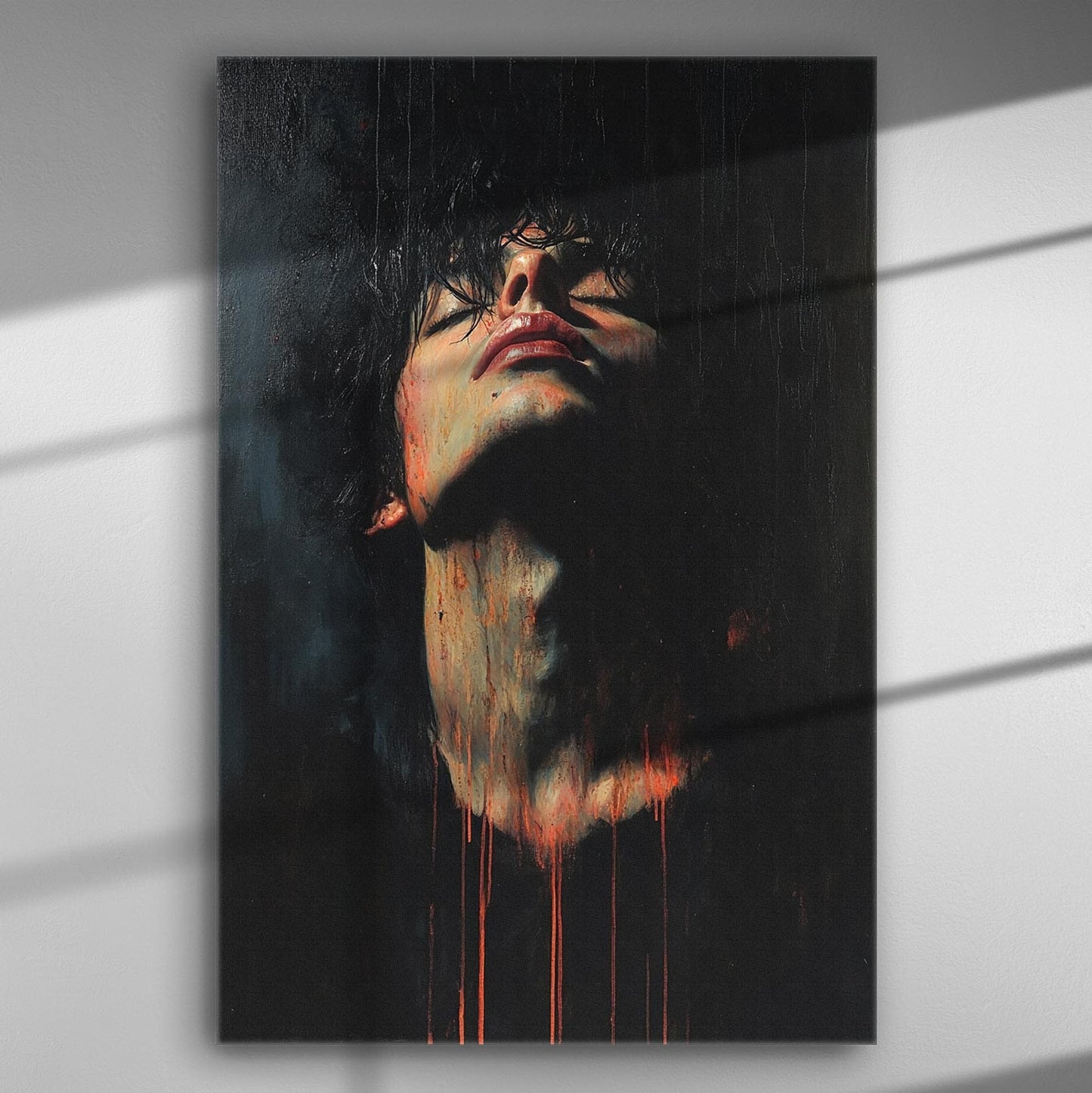 A dark expressive portrait with orange drips on a canvas.