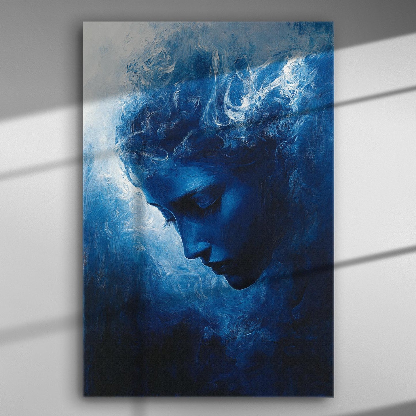 A blue-themed canvas print of a thoughtful figure surrounded by dark and enchanting shadows.