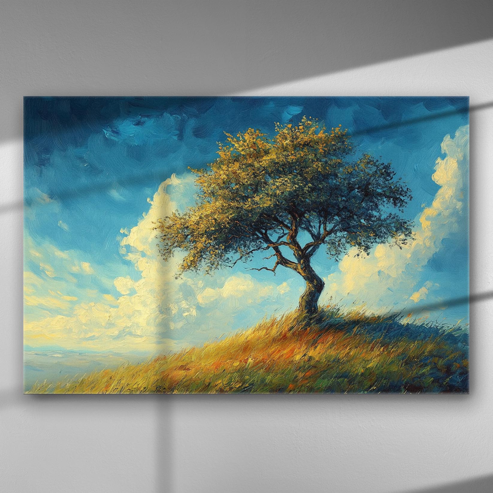 Canvas print of a single tree on a hilltop with a blue sky and clouds.