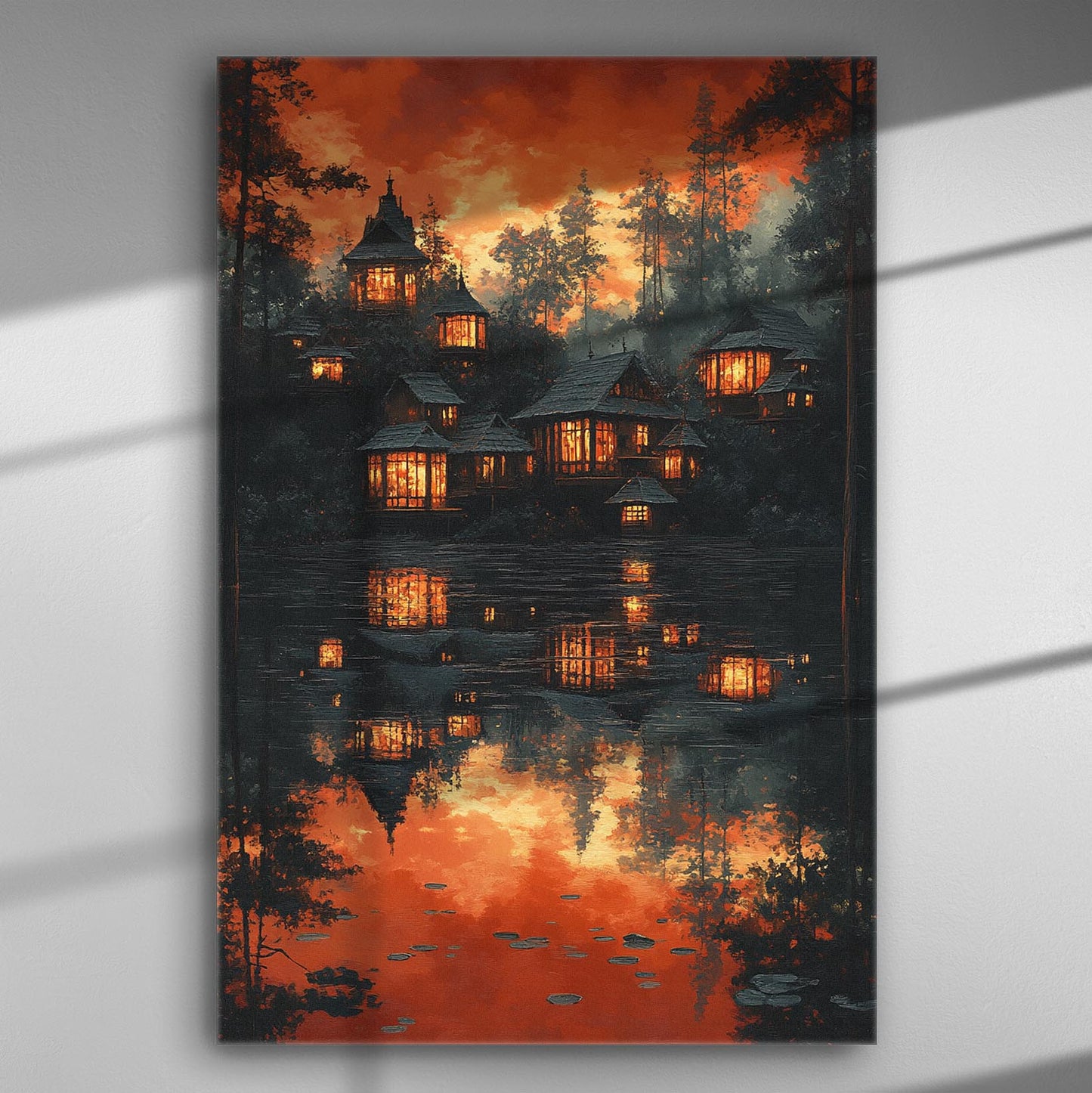 Serene village reflecting on tranquil lake with warm orange and red tones canvas print.