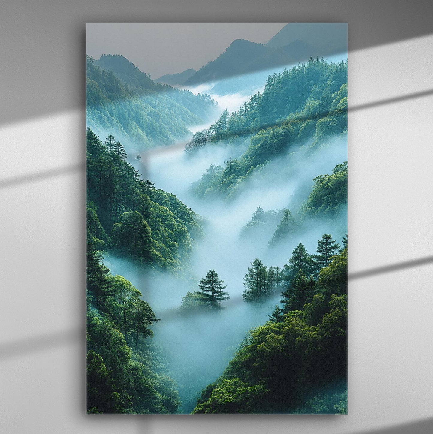 Misty mountain landscape with dense forests and fog, captured on a canvas print.
