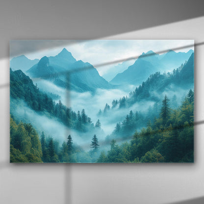 A serene mountain landscape shrouded in mist, with blue and green tones on a canvas print.