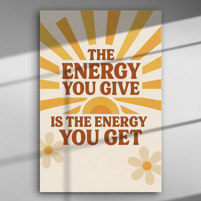 Canvas with motivational quote 'The energy you give is the energy you get' in warm colors with sun rays and flowers.