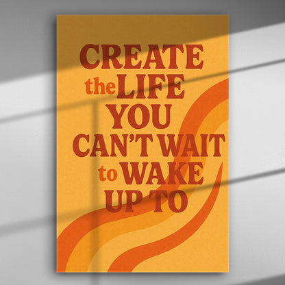 Motivational canvas with the quote 'Create the Life You Can't Wait to Wake Up To' in orange and red on yellow background.
