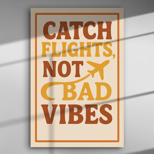 Decorative canvas with the text 'Catch Flights, Not Bad Vibes' in warm colors.