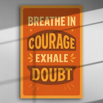 Canvas print with the inspirational quote 'Breathe in courage, exhale doubt' in bold typography, with orange and brown colors.
