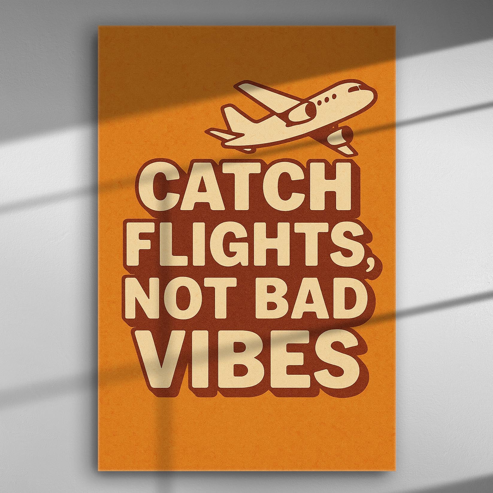Catch Flights Not Bad Vibes motivational airplane canvas print in orange and brown.