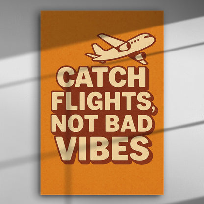 Catch Flights Not Bad Vibes motivational airplane canvas print in orange and brown.
