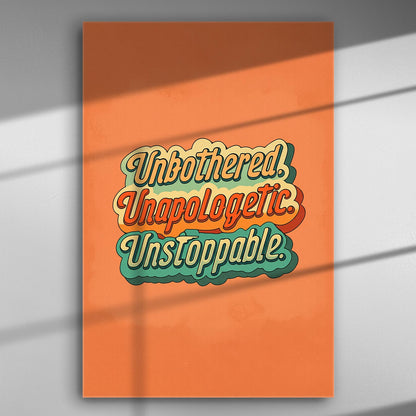 Inspirational text on orange canvas: Unbothered, Unapologetic, Unstoppable