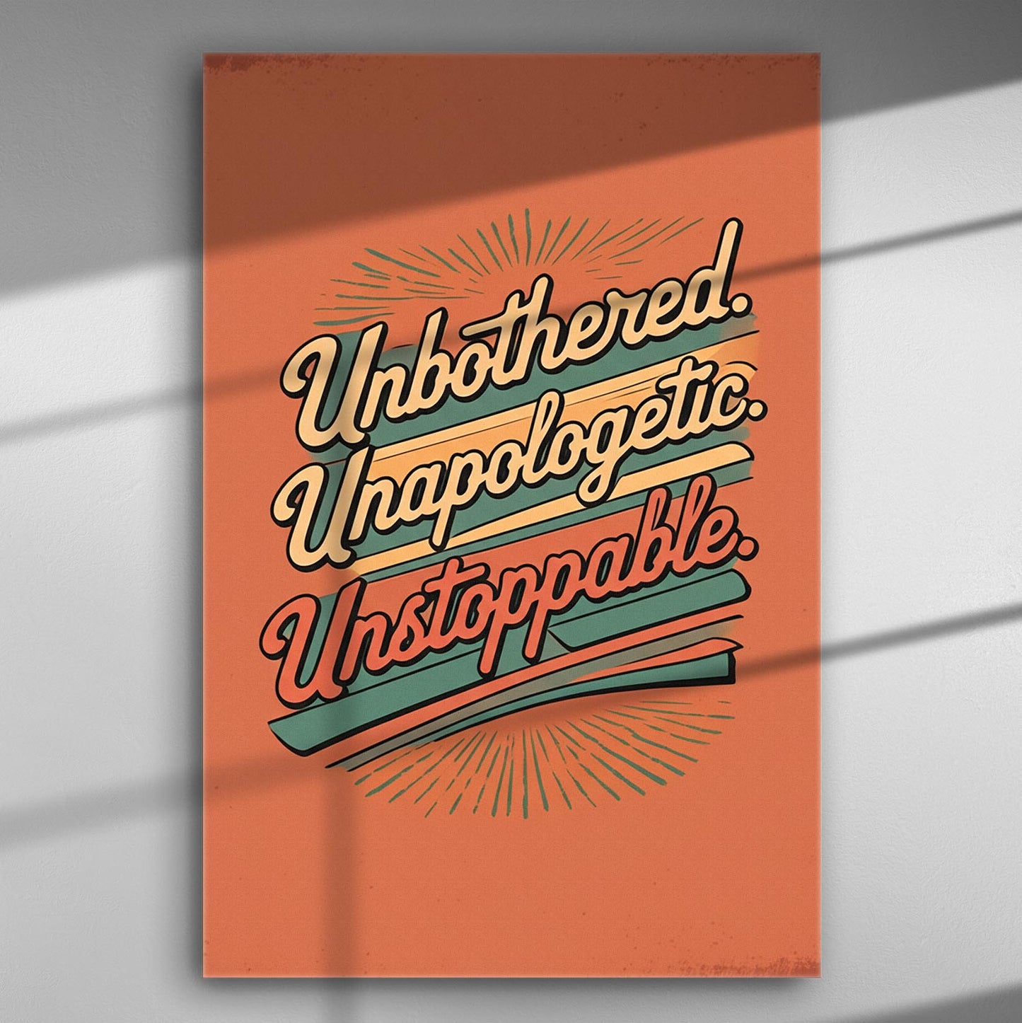 Canvas print with the text 'Unbothered. Unapologetic. Unstoppable.' on an orange background.