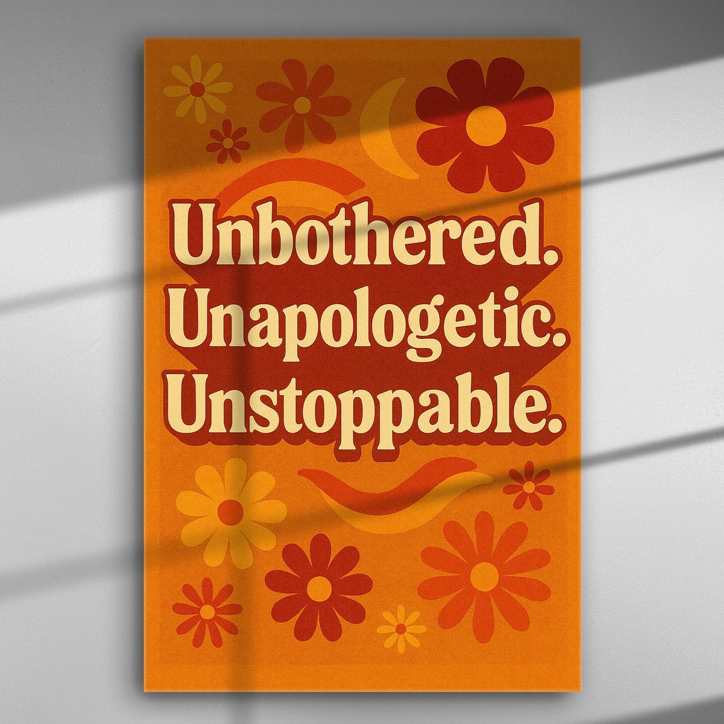Canvas with bold text 'Unbothered. Unapologetic. Unstoppable.' and colorful flowers on an orange background.