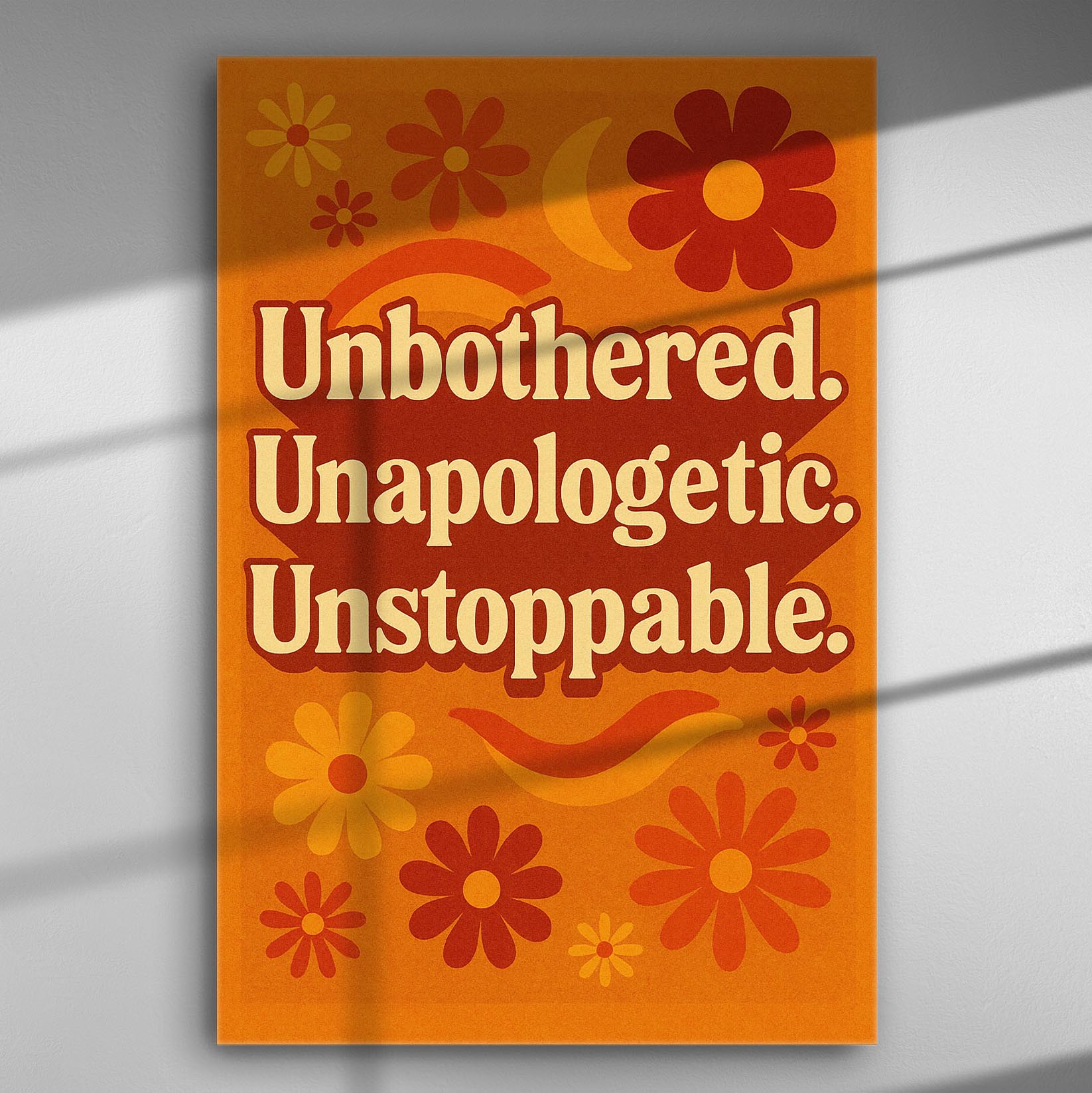 Canvas with bold text 'Unbothered. Unapologetic. Unstoppable.' and colorful flowers on an orange background.