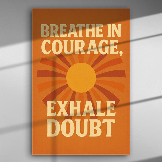 Canvas print with motivational quote 'Breathe in Courage, Exhale Doubt' with orange and yellow sunburst design.