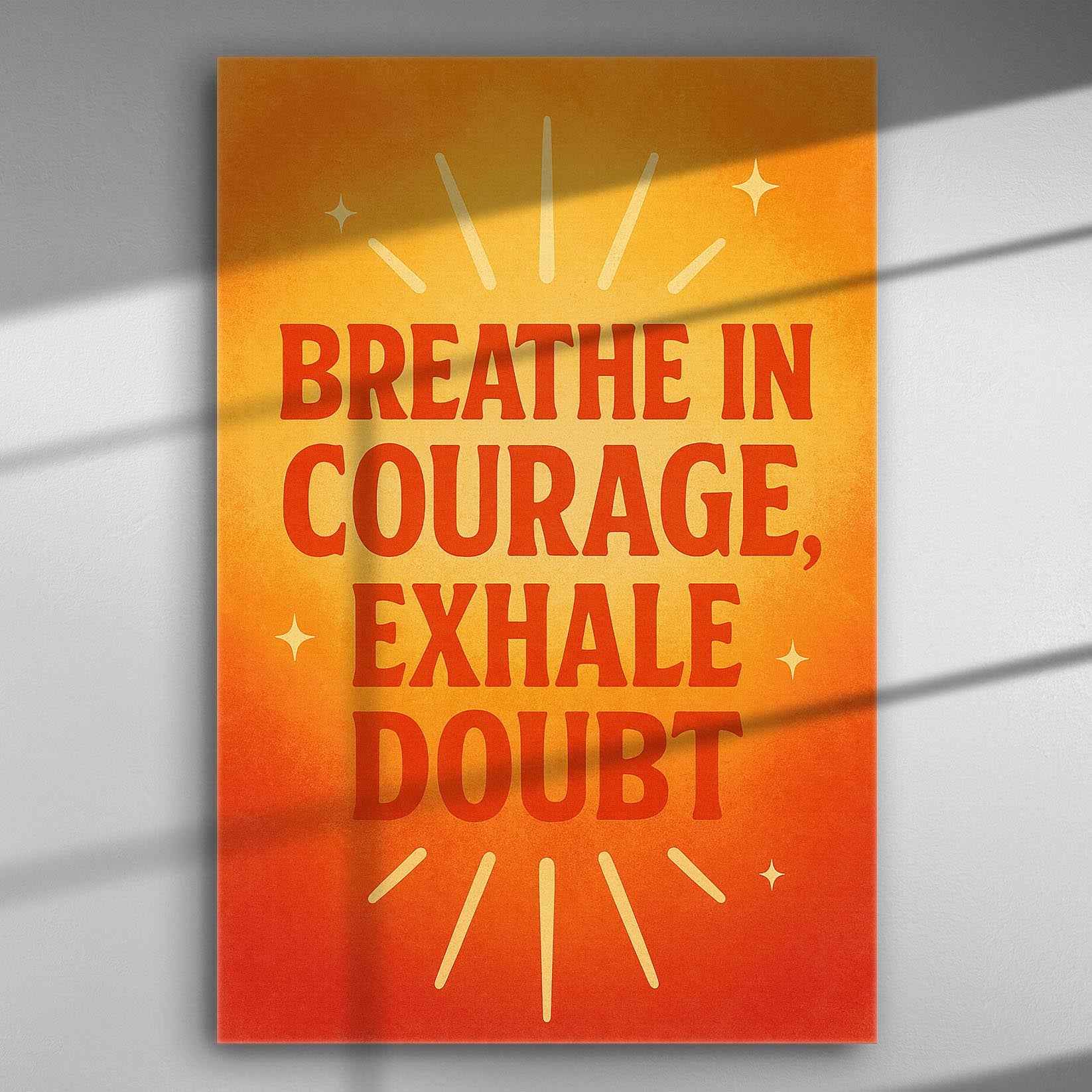 Canvas print with inspirational quote 'Breathe in Courage, Exhale Doubt' in shades of orange and red.