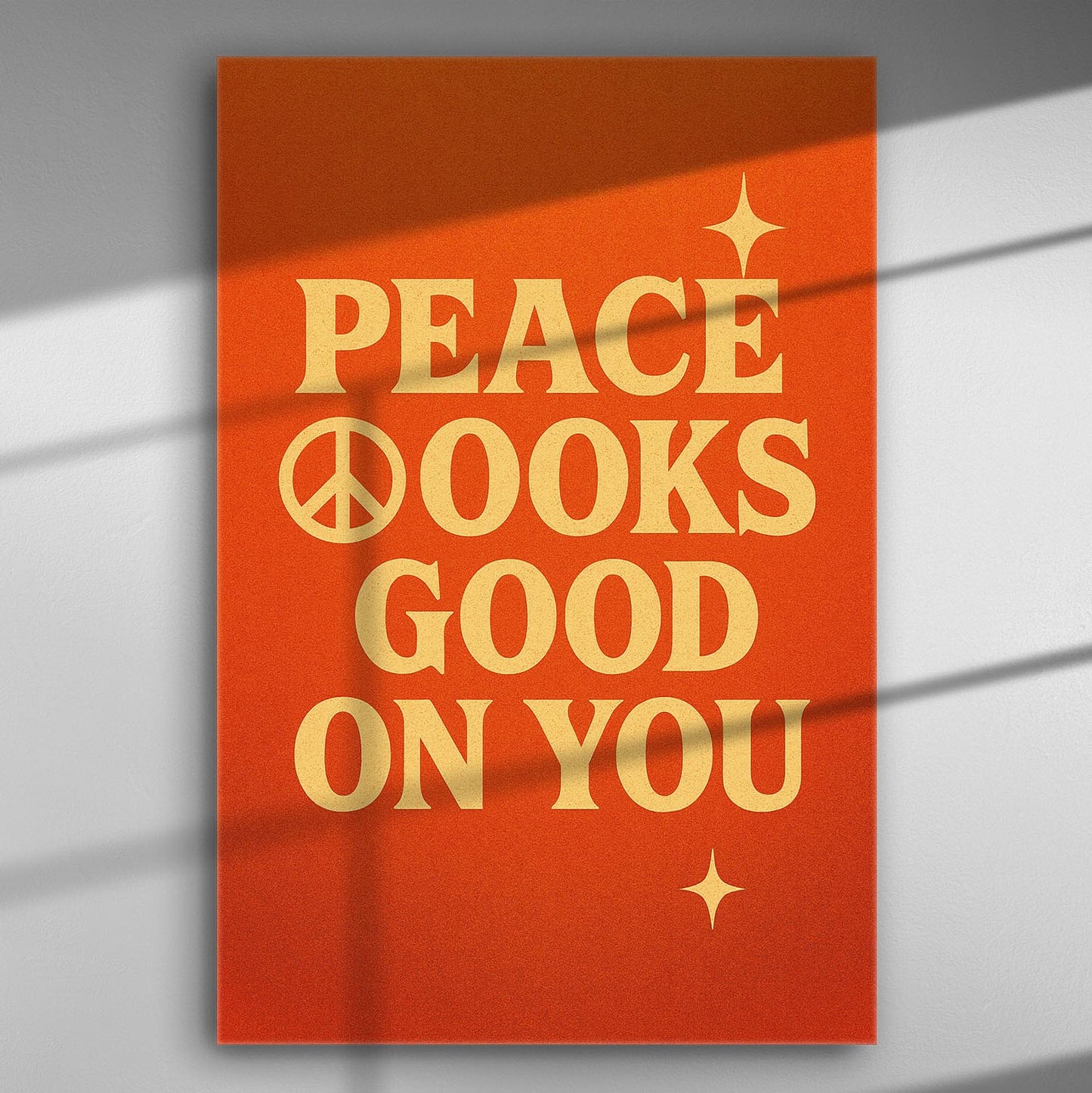 Orange canvas with the phrase 'Peace Looks Good on You' in bold letters