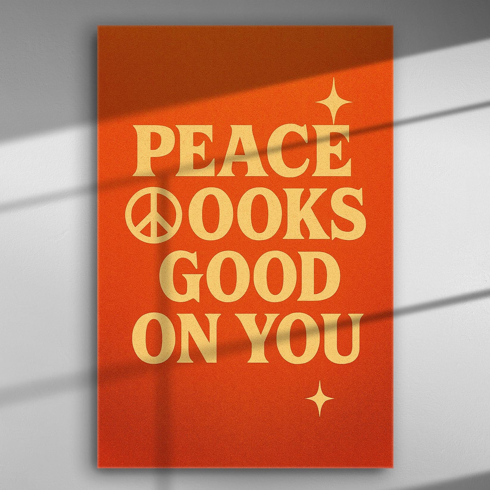 Orange canvas with the phrase 'Peace Looks Good on You' in bold letters