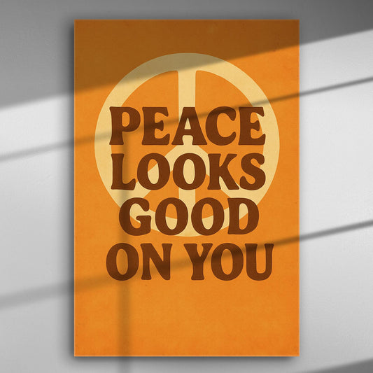 Canvas print with the text 'Peace Looks Good On You' in bold typography and a peace symbol in the background.