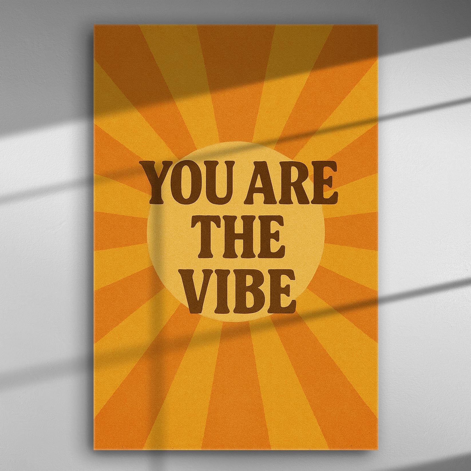 Inspirational canvas print with text 'You Are The Vibe' and sunbeam design in orange and yellow.