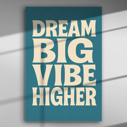 Canvas print with the inspirational phrase 'Dream Big Vibe Higher' on a blue background.