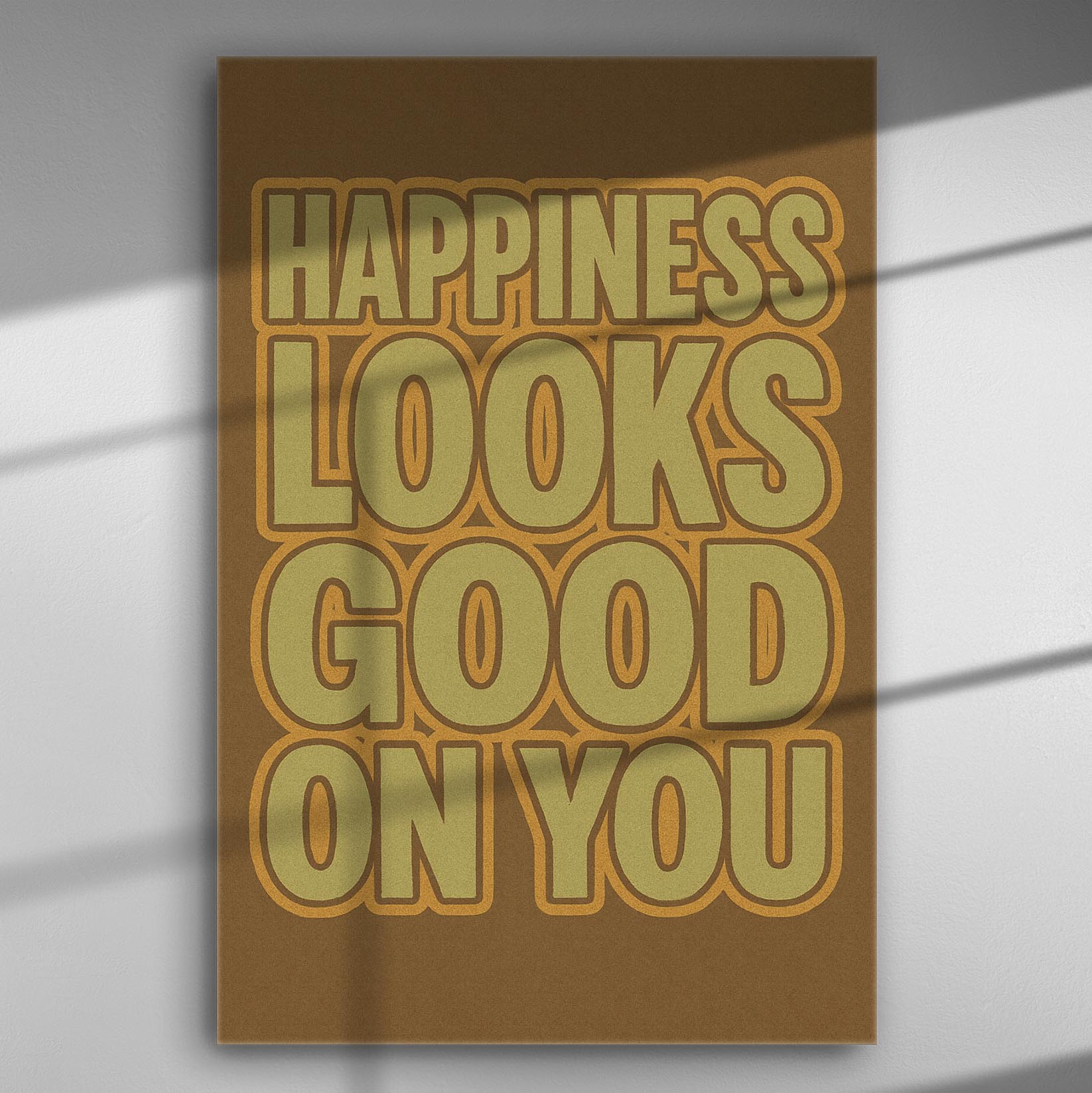 Canvas print with the text 'Happiness Looks Good On You' in warm colors.