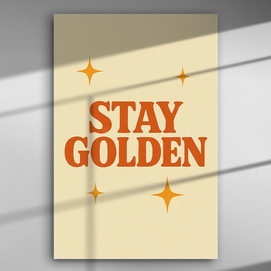 A canvas print with the phrase 'Stay Golden' and star designs on a light cream background.