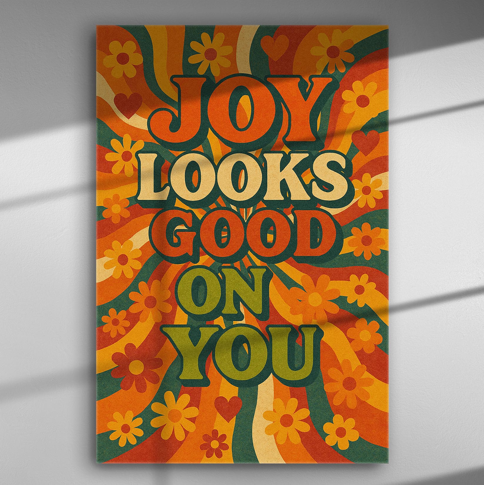 Retro style canvas print with the phrase 'Joy Looks Good on You' surrounded by colorful flowers.
