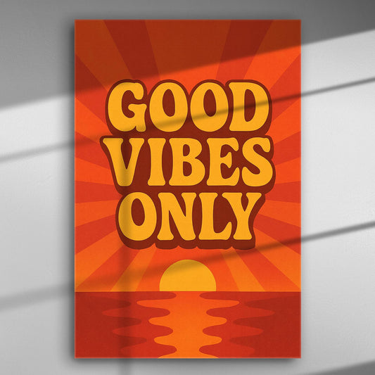Canvas print with the words 'Good Vibes Only' in bold yellow letters on a backdrop of a sunset with orange and red hues.