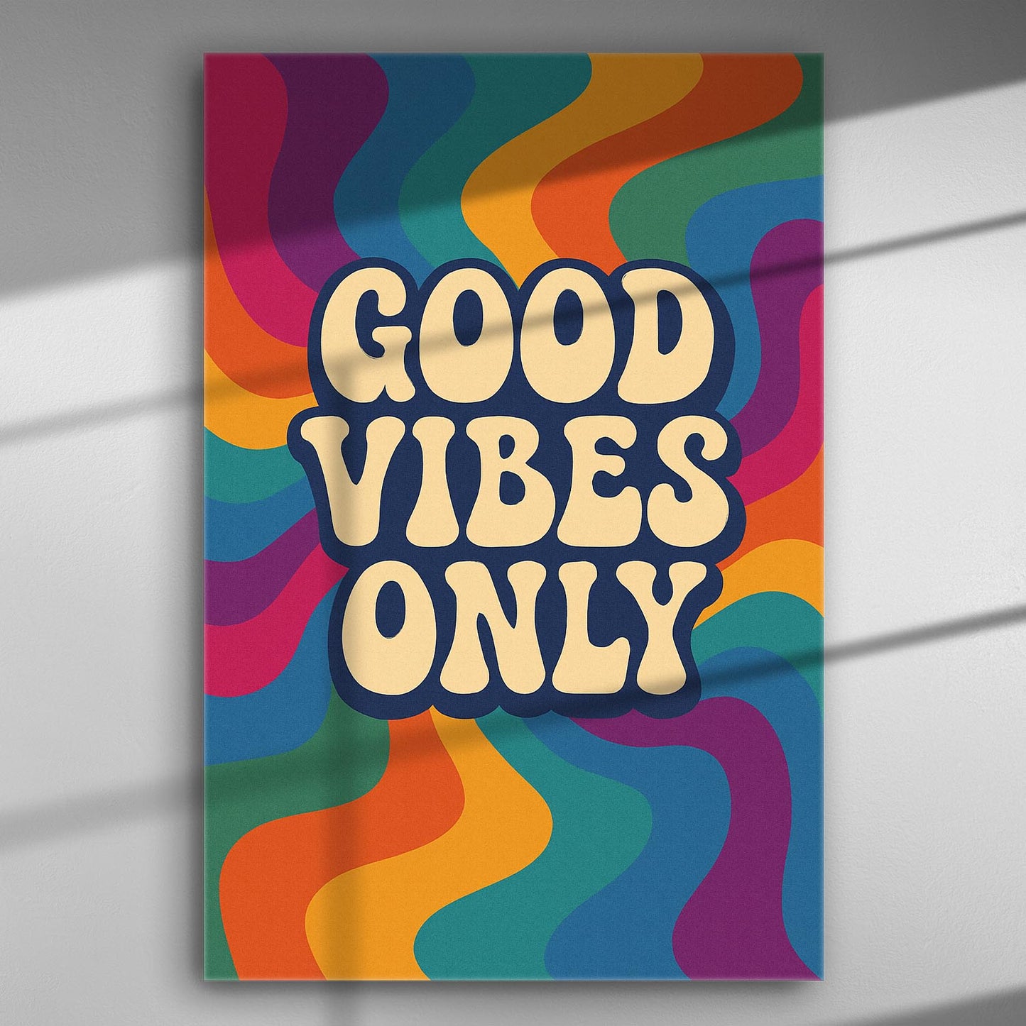 Colorful canvas print with the words 'Good Vibes Only' in vintage style lettering with wavy patterns.