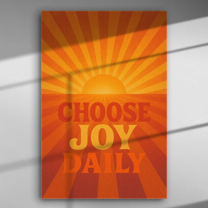 Motivational canvas print with a sunburst and the phrase 'Choose Joy Daily' in orange and yellow hues.