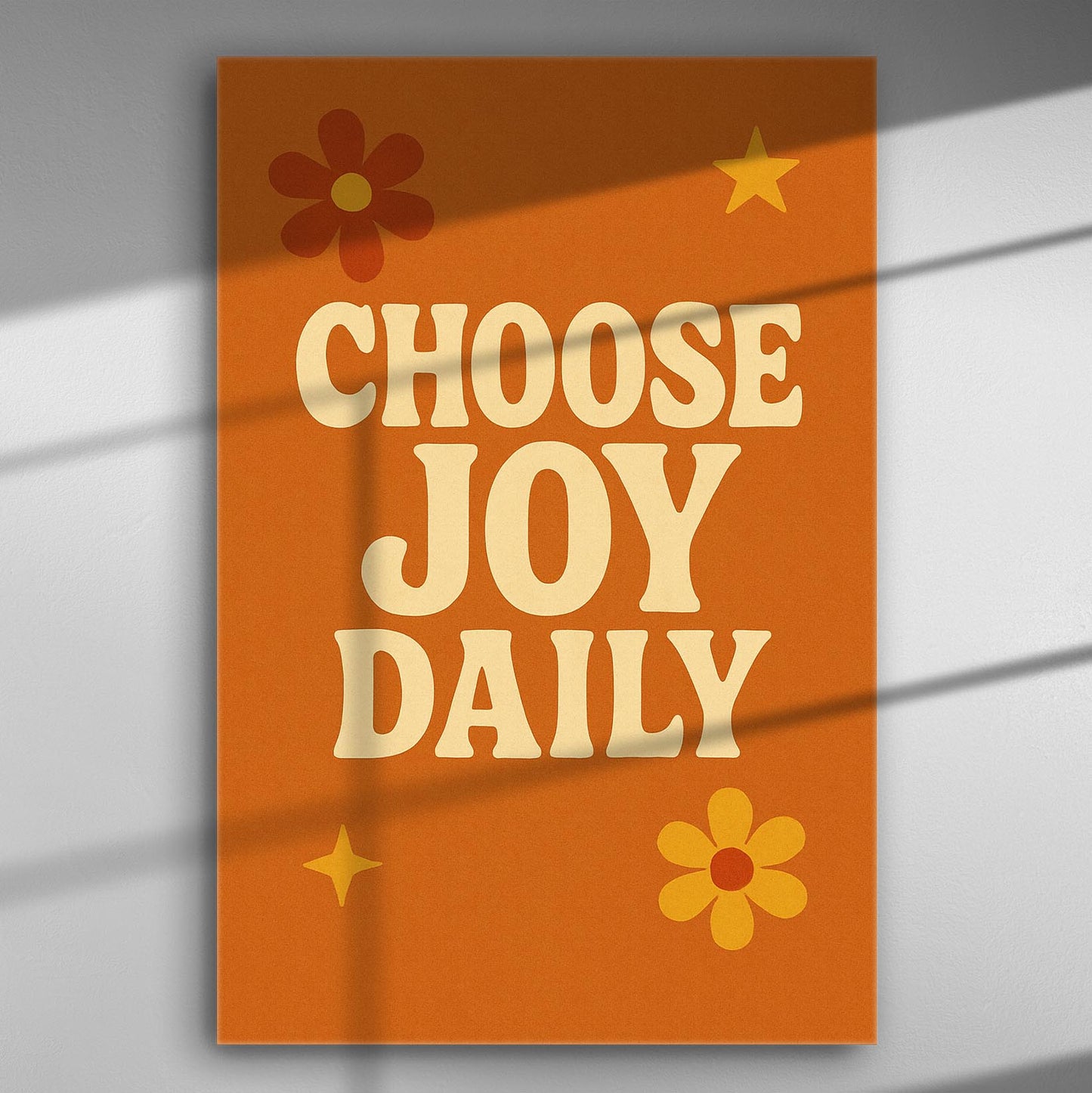 Orange canvas with text 'Choose Joy Daily' and floral designs for positivity