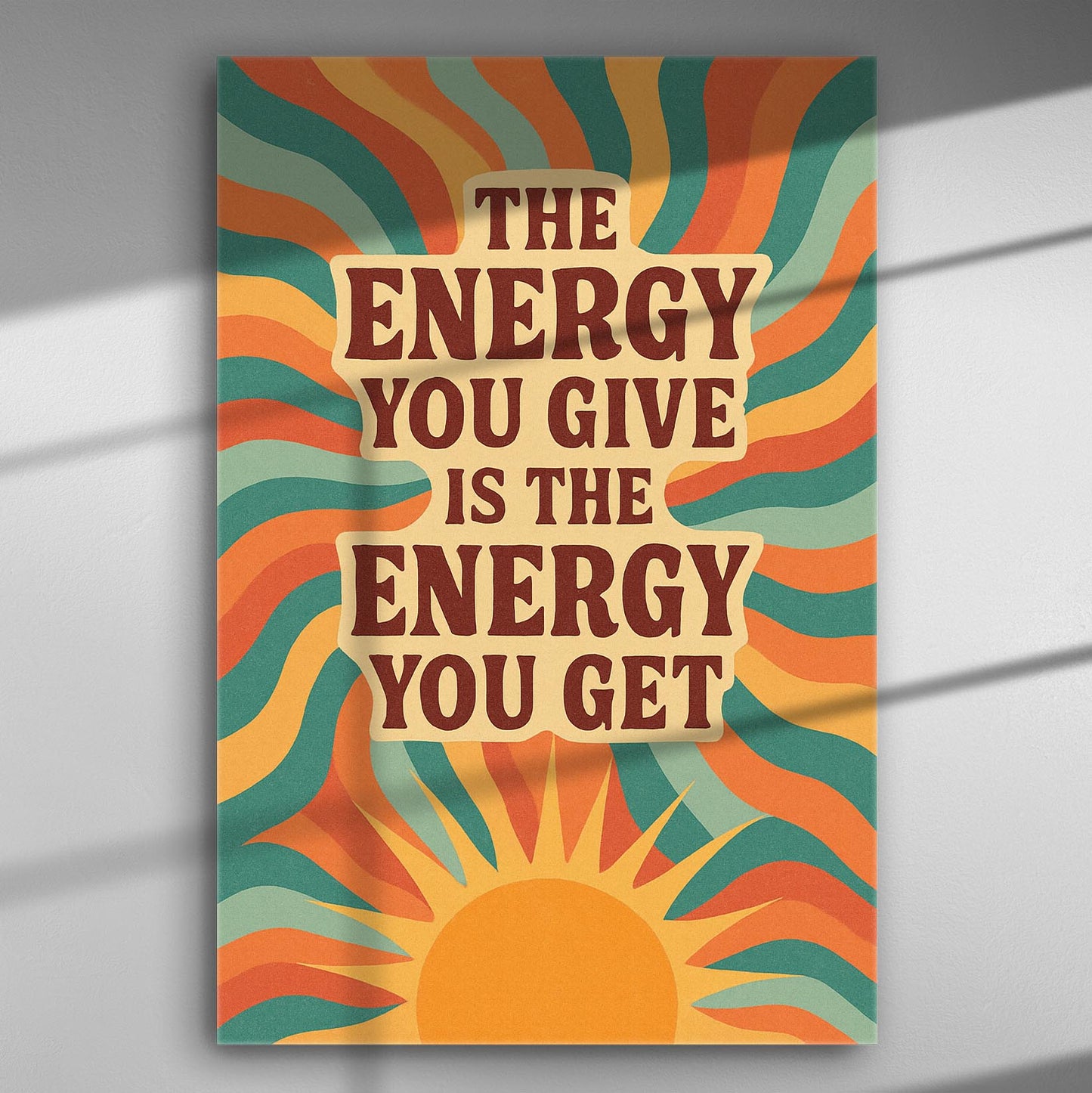 Retro style canvas print with the phrase 'The Energy You Give is the Energy You Get' surrounded by colorful sunburst patterns.