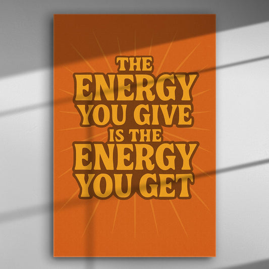 Canvas print with the quote 'The energy you give is the energy you get' on an orange background.